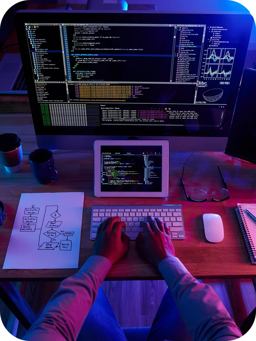 Hacker performing a cyberattack at night, representing custom software development.